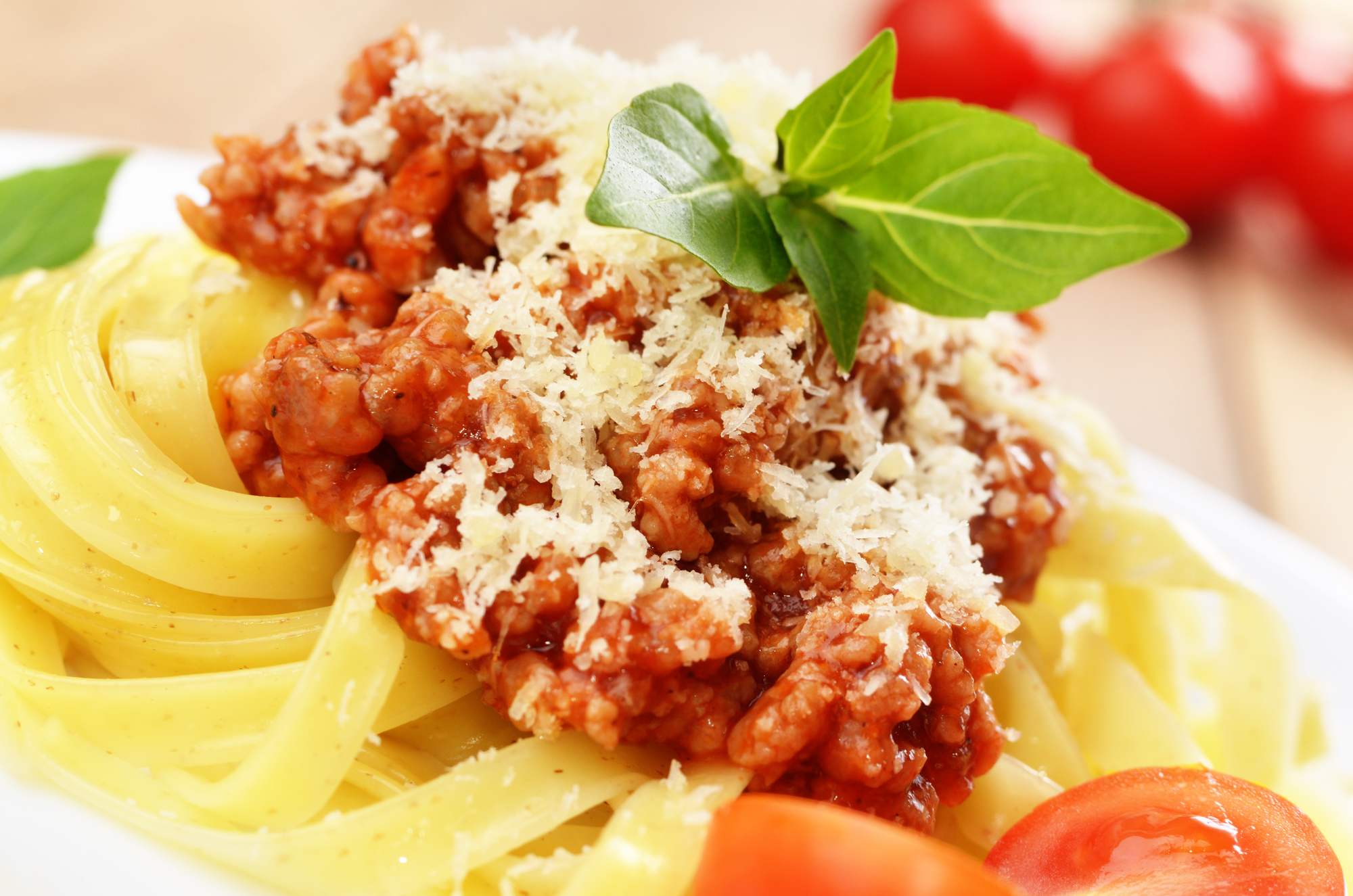 Pasta tagliatelle with beef sauce and parmesan